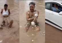 सड़क के गड्ढे में बैठकर युवक ने किया ‘स्नान’, VIDEO वायरल; बदहाल NH को लेकर अनोखा प्रदर्शन